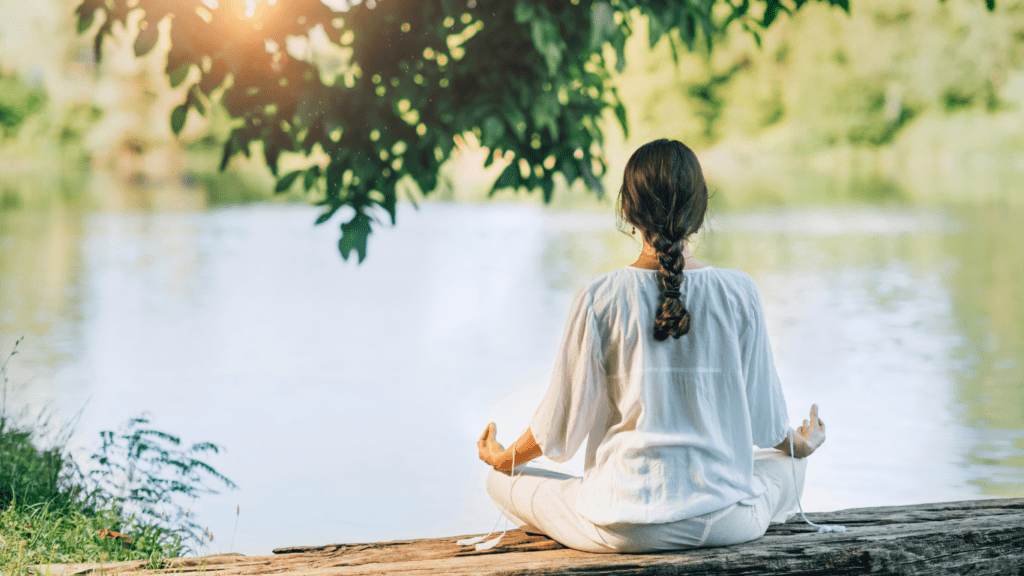 Woman sitting in lotus position