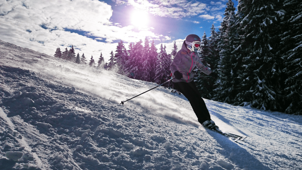 girl skiing down the slope