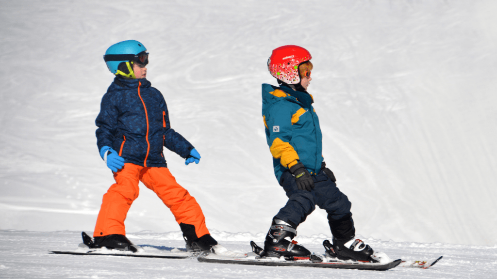 Two boys skiing