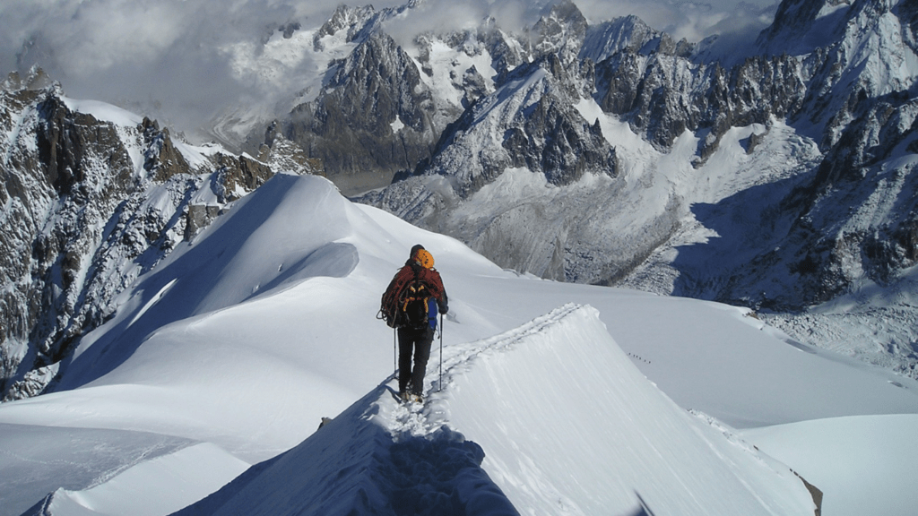 man standing in a snow field