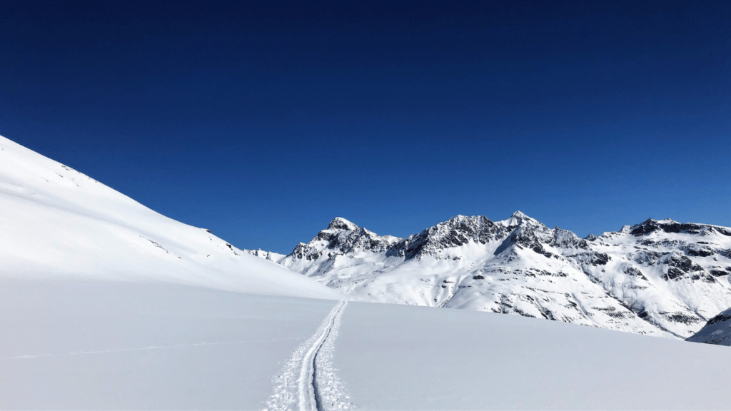 snow with ski trail