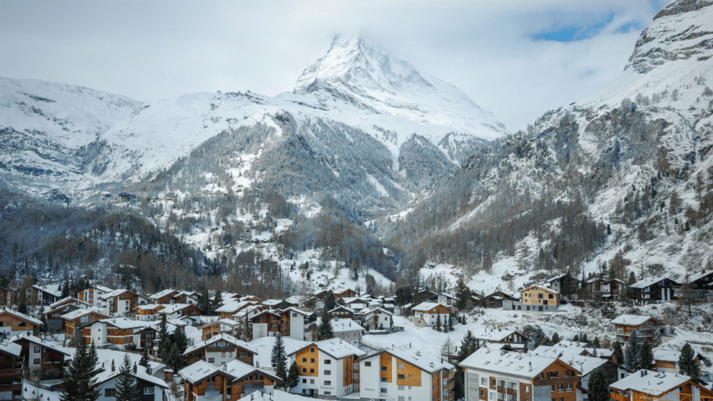 scenic view of a houses and mountain