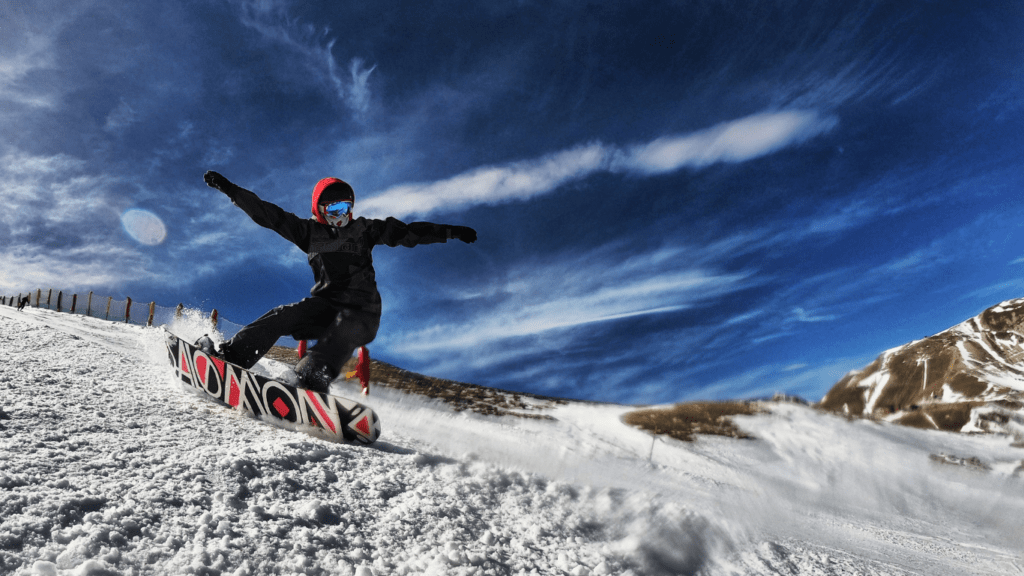 man enjoying his snowboarding