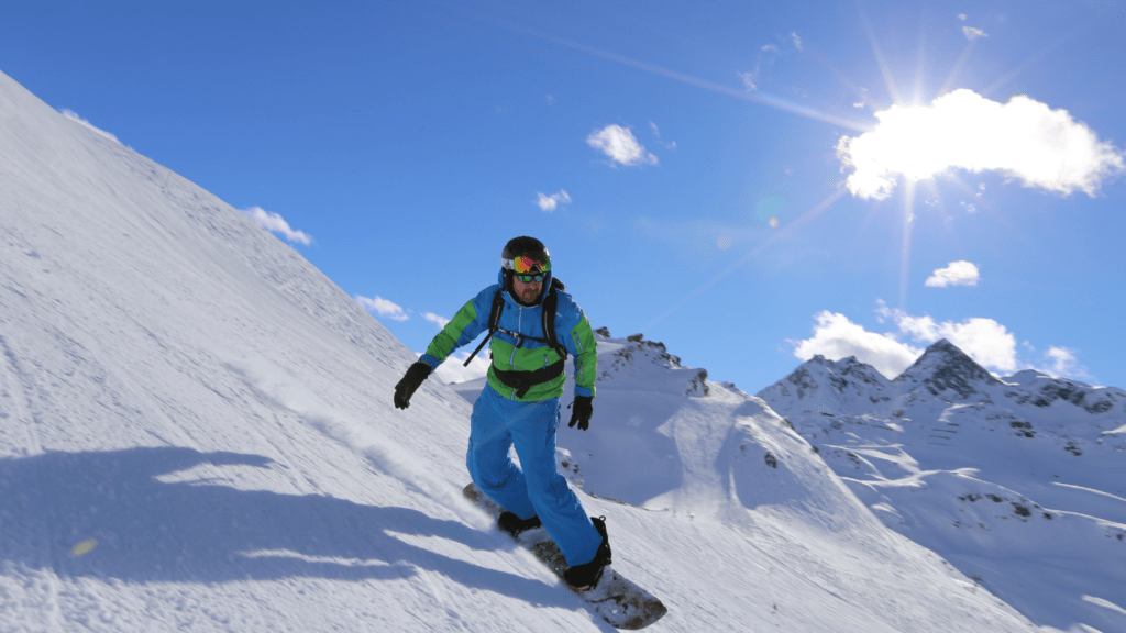 man enjoying his snowboarding