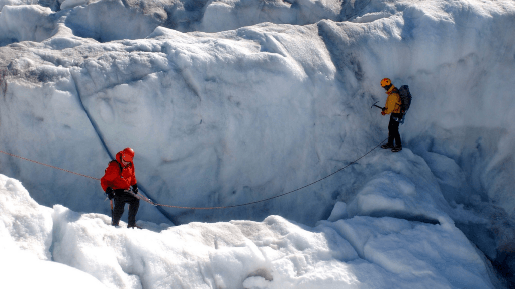 two men ice climbing