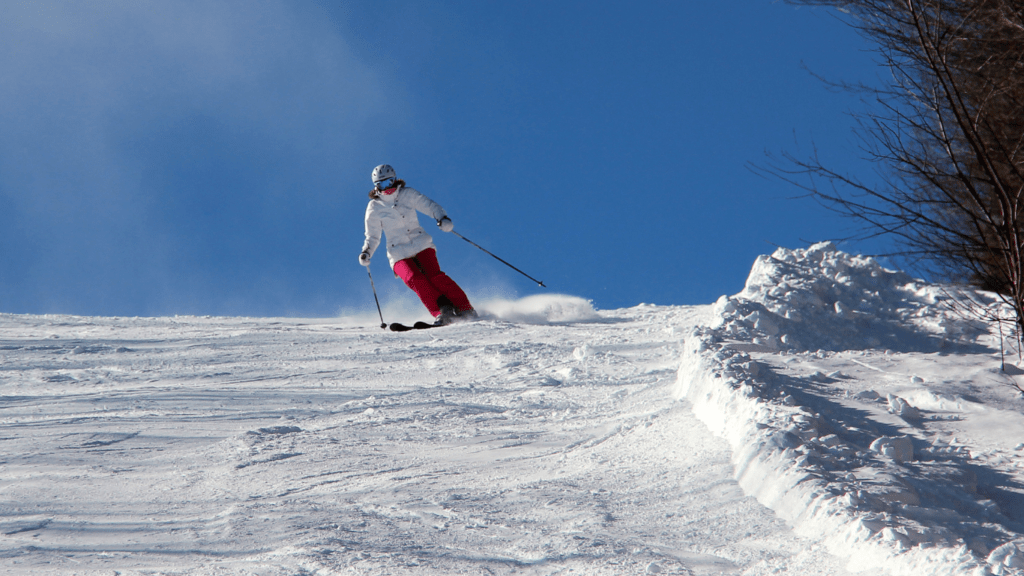 woman skiing on frozen hill