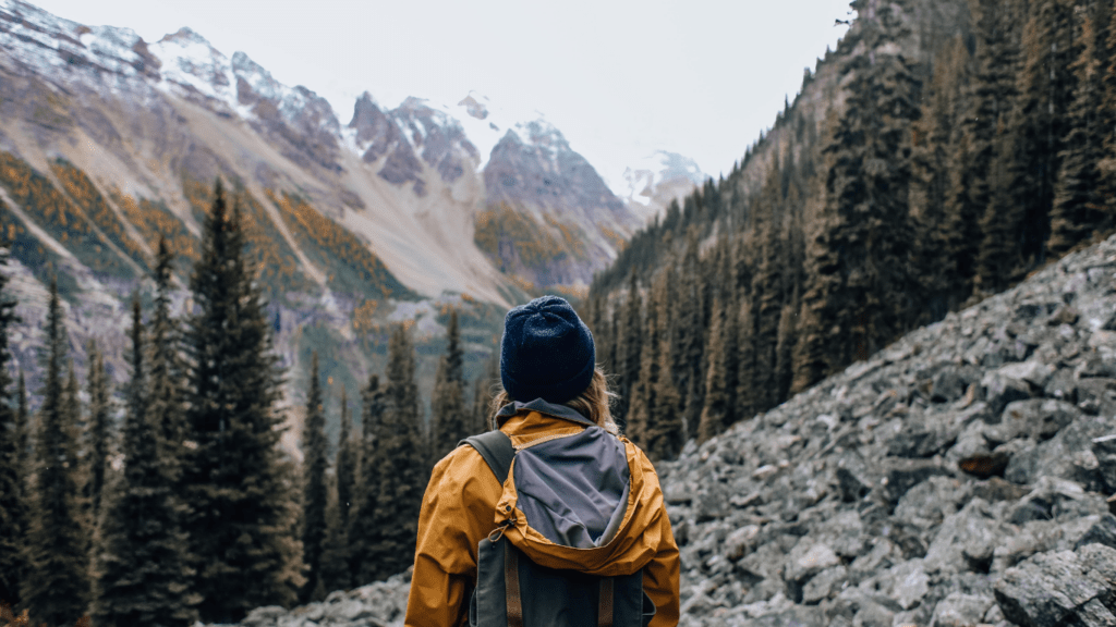 woman standing on mountainside